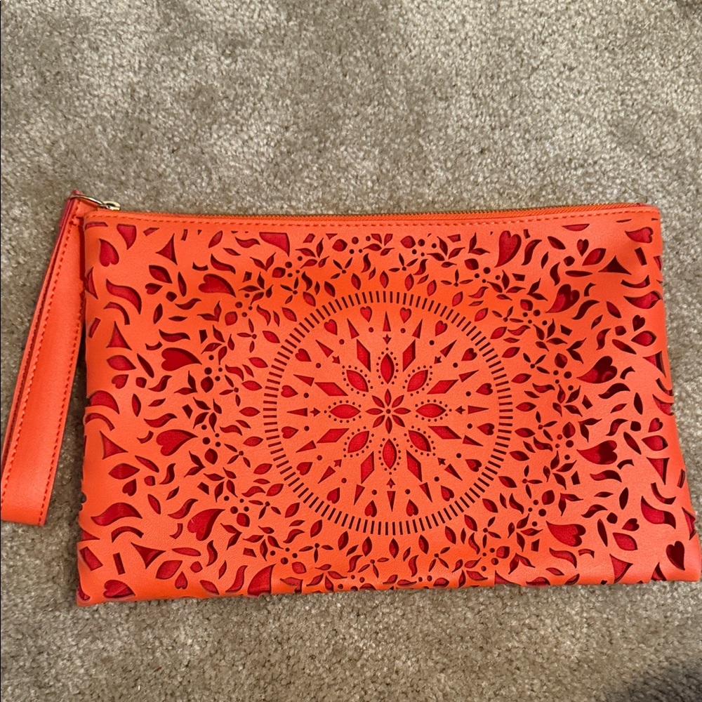 Carlos by Carlos Santana Orange Laser-Cut Wristlet Clutch